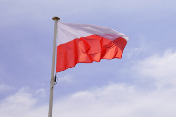 flag poland polish National state flag on wind mat with blue cloud sky