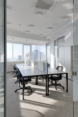large office with several jobs, interior of modern office, modern office with panoramic windows and city views