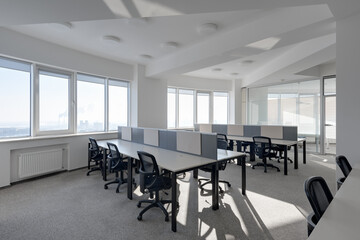 large office with several jobs, interior of modern office, modern office with panoramic windows and city views