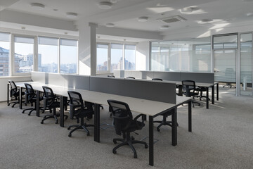 modern bright office, open workspace with tables and chairs