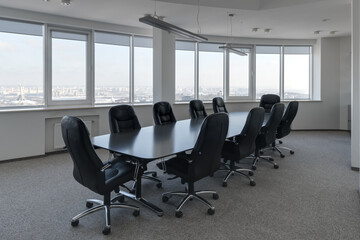 conference room, meeting room, office space with large windows, table and chairs