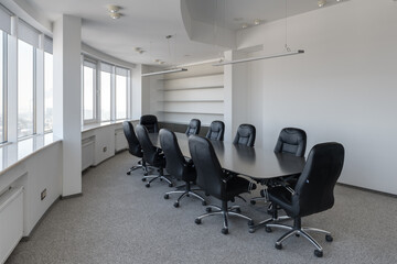 conference room, office space with large windows, table and chairs