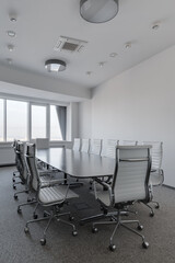 conference room, office space with large windows, modern bright office