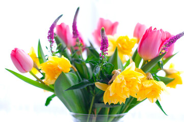 Bright bouquet of spring flowers. Image with selective focus
