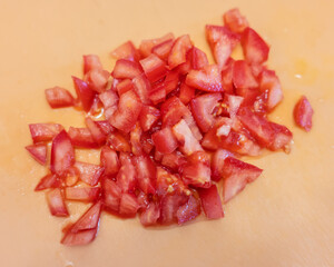 Finely chopped tomato for homemade pizza.