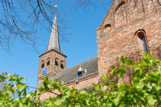 View on the romano-gothic protestant church of Burgum, The Netherlands from the 13th century. Also known as Cross Church, Saint Martin's church or Kruiskerk. 