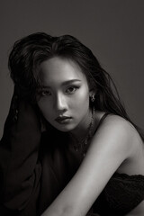 High fashion portrait of young elegant woman. Black and White image