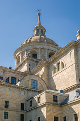 Fototapeta na wymiar Royal Monastery of San Lorenzo de El Escorial. Dome rear view. Located in the Community of Madrid, Spain, in the town of El Escorial. Built in the sixteenth century and declared a World Heritage Site.