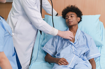 Doctor use stethoscope checking patient at hospital