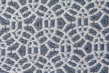 Abstract circular print background on cotton fabric in gray tone