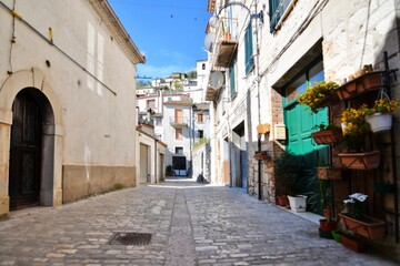 Fototapeta na wymiar A narrow street in Morcone, a small village in Campania region, Italy.