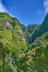 Fototapeta na wymiar 25 fountains, waterfall, walk on the levadas in Madeira, beautiful madeira mountains overlooking the valley with flowing clouds, infinite cloud, pond, lagoon