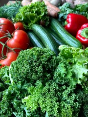 A collection of fresh and delicious vegetables. Organic vegetables on wood. Harvested vegetables.