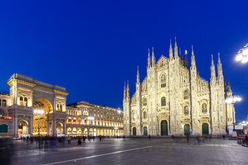 Fototapeta na wymiar Milan Cathedral Duomo di Milano church and Galleria Vittorio Emanuele travel traveling holidays vacation town at twilight in Italy