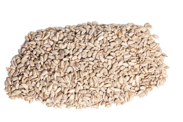 Delicious peeled sunflower seed, isolated on white background