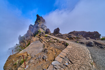 Mountain trek to the Pico Ruivo mountains from Pico Arieiro, highest mount, tropical nature, dangerous travel
