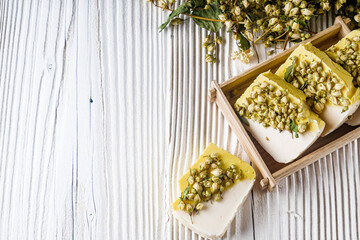 handmade soap on a white wooden rustic background