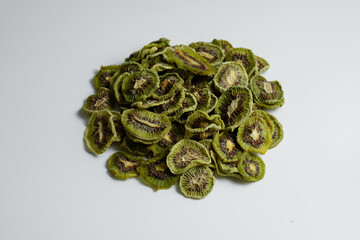 Natural Dried Kiwi Slices Snack. Dried Kiwi for baking.  Isolated white background.