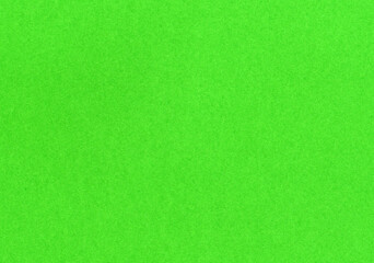 High detail scan of a paper texture background with fine fiber grain bright, neon green uncoated bond paper for wallpaper and design mockup with copy space for text