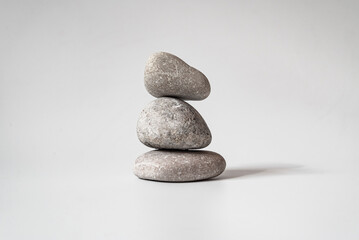 Stack of white natural zen stones. your mind, your soul balancing, begging, meditation concept.	

