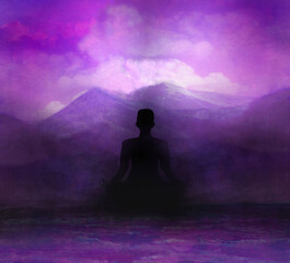 man meditating in the mountains at sunset