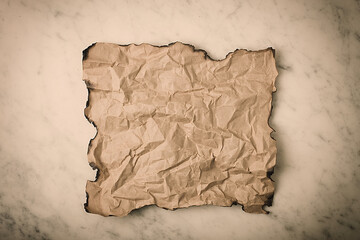 Abstract background, crumpled sheet of kraft paper, with burnt edges, rustic, toned, no people, horizontal,