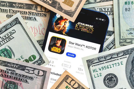 Star Wars Kotor mobile game app. Money background. Concept, company making money with popular mobile phone games