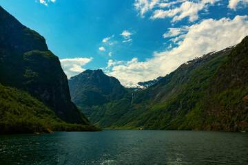 Fototapeta premium Amazing beautiful view of the Nærøyfjord in Norway Scandinavia with snow mountains and colorful fjord