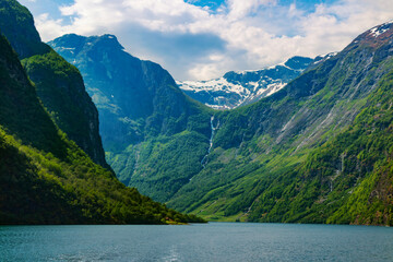 Fototapeta na wymiar Amazing beautiful view of the Nærøyfjord in Norway Scandinavia with snow mountains and colorful fjord