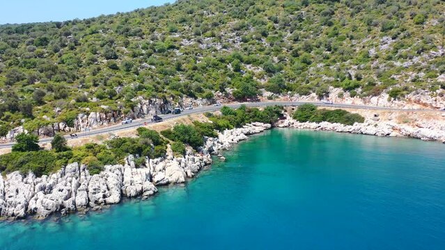 Beautiful rocky cove alongside a coastal road in Finike Turkey near the Mediterranean Sea on a sunny summer day