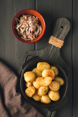 Fresh Cooked, new potatoes,with dill, on a wooden table, selective focus. close-up, toning, no people,