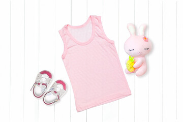 T-shirt with a short sleeve on a white background with a toy