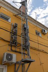 Cellular antenna on the facade of the house.