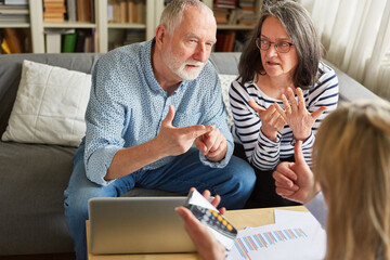 Seniors and financial advisors calculate retirement plan - obrazy, fototapety, plakaty