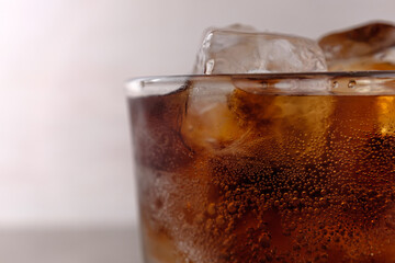 Cool, sweet and carbonated beverage cola