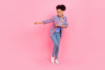 Full length body size view of attractive cheerful dreamy wavy-haired girl dancing having fun isolated over pink pastel color background