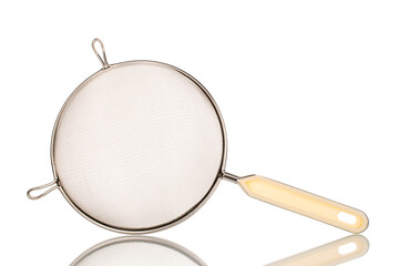 One metal sieve for the kitchen, close-up, isolated on a white background.