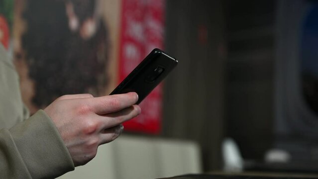 person using mobile phone for online shopping,social media,checking mailbox