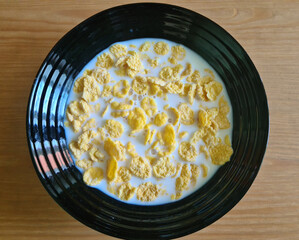 Corn flakes with milk closeup. Healthy breakfast cereal