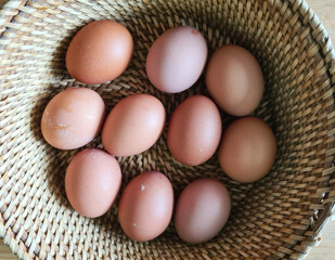 Eggs in basket. Useful products for cooking in kitchen