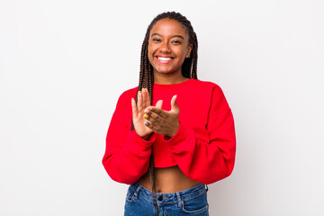 afro pretty woman feeling happy and successful, smiling and clapping hands, saying congratulations...