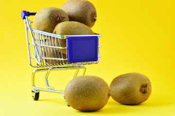 shopping cart with fruit, kiwi