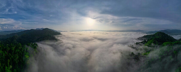 Aerial and panorama view over Khao Kai Nui mountain in Thailand show mist or fog with sun rise in morning.