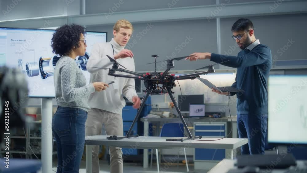 Aufkleber diverse science specialists looking at drone and talk about it in scientific laboratory. aviation en