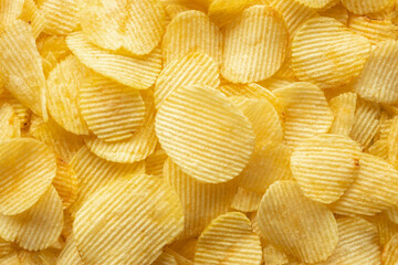 crispy golden potato chips snack texture background