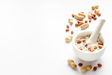 Peanut flour in bowl - gluten free nuts flour for baking