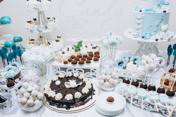 Delicious sweet buffet with cupcakes. Sweet holiday buffet with cupcakes and other desserts. Candy Bar.