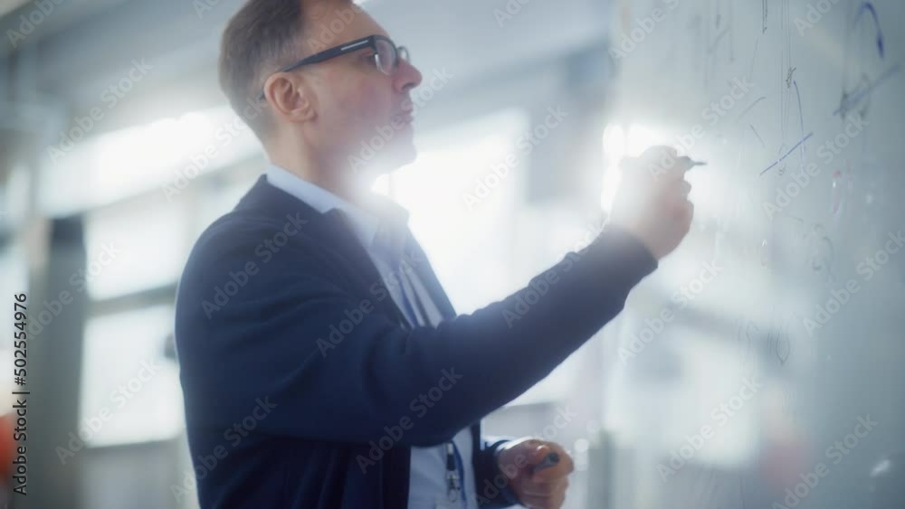 Poster Creative Scientist Man Wearing Glasses Illustrate Working Methods and Draw Statistical Charts on Whiteboard. Science, Conceptuality and Problem Solving Concept