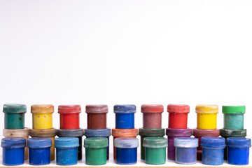 vintage gouache paints on an insulated white background
