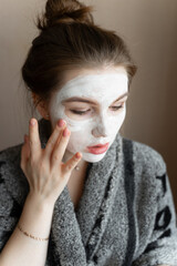 portrait of a girl in a clay mask